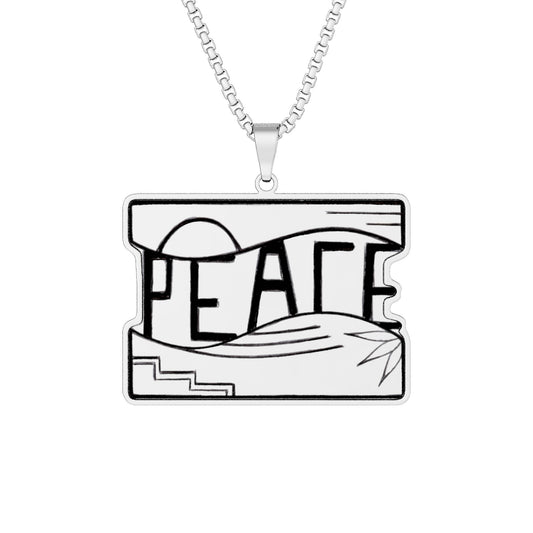 A silver rectangular pendant necklace featuring a black and white graphic design with the word 'PEACE' integrated into stylized waves and geometric shapes, suspended from a silver box chain against a plain white background.  Also available in Stainless Steel and Gold.